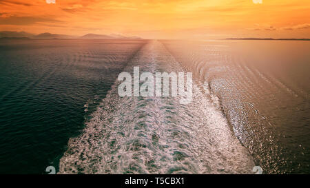 Cruise Ship Wake in Mediterranean Sea at Sunset - Travel Vacation Stock Photo