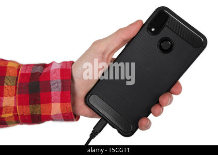 Mans hand holding black screen mobile phone Stock Photo