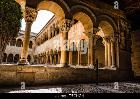 Santo Domingo de Silos, Spain - April 16, 2019: The cloister of Santo Domingo de Silos Abbey. It is a Benedictine monastery and a masterpiece of Roman Stock Photo