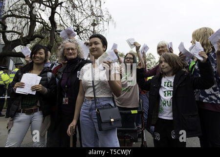 London, Greater London, UK. 23rd Apr, 2019. Baroness Jenny Jones (2nd from left) walking to Parliament with ten Extinction Rebellion protesters selected to deliver letters to the MPs .Extinction Rebellion protesters march from Marble Arch to Parliament Square, attempting to deliver letters to their MPs. Extinction Rebellion activists were permitted to be in Parliament Square but not to enter Parliament. After several attempts to deliver the letters, the activists reached an agreement with MPs through the police. Ten activists were allowed to deliver the letters in the company of Stock Photo