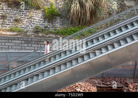 Chongqing, Chongqing, China. 24th Apr, 2019. Chongqing, CHINA-The 60-meter-long and 28-meter-tall escalator can be seen at the mountain in southwest ChinaÃ¢â‚¬â„¢s Chongqing. Credit: SIPA Asia/ZUMA Wire/Alamy Live News Stock Photo