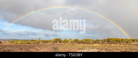 Rainbow viewed from Hog Bay Road, Kangaroo Island, South Australia Stock Photo