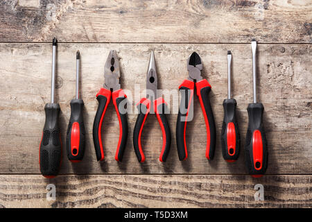 Building tools repair set on wooden background. Top view. Stock Photo