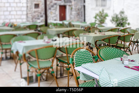 Tables in the restaurant in the open air. Stock Photo