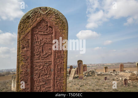 Ancient muslim cemetery near Agstafa, Azerbaijan with writings on farsi for graphic and web design, for website or mobile app. Stock Photo