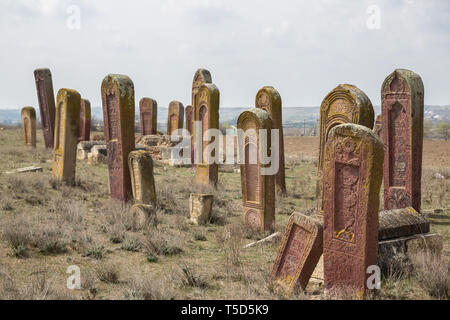 Ancient muslim cemetery near Agstafa, Azerbaijan with writings on farsi for graphic and web design, for website or mobile app. Stock Photo