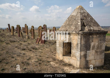 Ancient muslim cemetery near Agstafa, Azerbaijan with writings on farsi for graphic and web design, for website or mobile app. Stock Photo