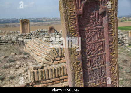 Ancient muslim cemetery near Agstafa, Azerbaijan with writings on farsi for graphic and web design, for website or mobile app. Stock Photo