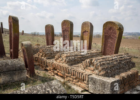 Ancient muslim cemetery near Agstafa, Azerbaijan with writings on farsi for graphic and web design, for website or mobile app. Stock Photo