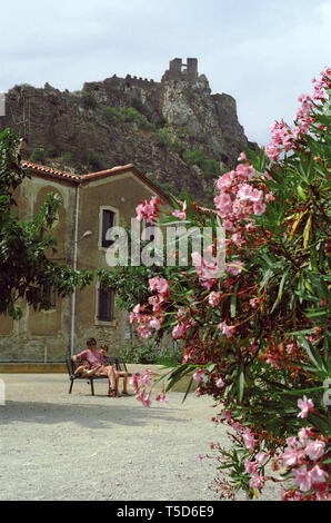 Padern and its chateau, Aude, Occitanie, France.  MODEL RELEASED Stock Photo