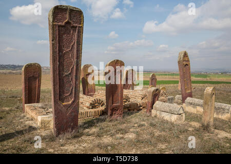 Ancient muslim cemetery near Agstafa, Azerbaijan with writings on farsi for graphic and web design, for website or mobile app. Stock Photo