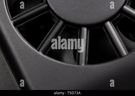 Black fan electronics close-up. Blades in focus. Stock Photo