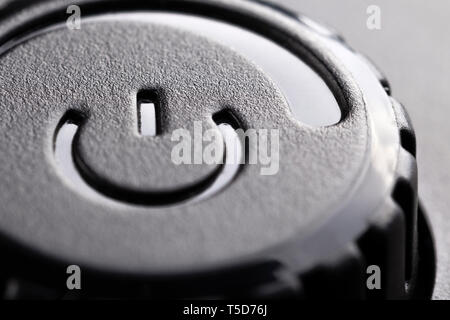 Black plastic power on off button with power adjustment. Close-up Stock Photo