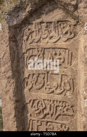 Ancient muslim cemetery near Agstafa, Azerbaijan with writings on farsi for graphic and web design, for website or mobile app. Stock Photo