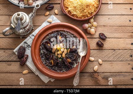 Slow cooked beef tajine with dates, raisins and almonds - moroccan cuisine, copy space Stock Photo