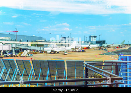 Airfield of Frankfurt Airport, planes, service cars, gangways, Germnay Stock Photo