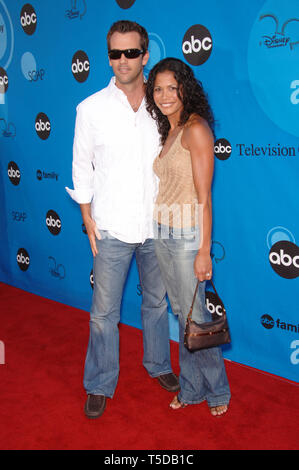 LOS ANGELES, CA. July 20, 2006: The Nine star LOURDES BENEDICTO & husband at the Disney ABC TV All Star Party at Kidspace in Pasadena. © 2006 Paul Smith / Featureflash Stock Photo