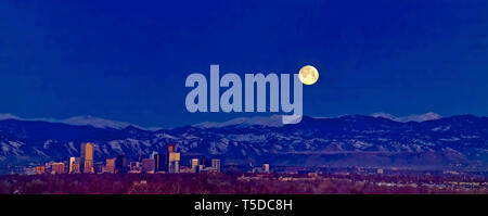 The worm moon sets behind the Rocky Mountains above the Denver skyline. Stock Photo