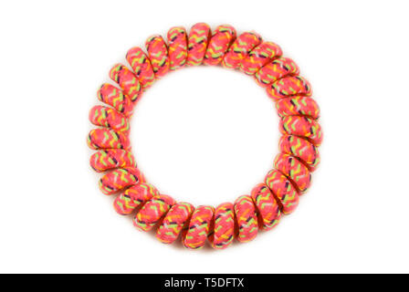 Multi-colored scrunchy in the form of a spiral Stock Photo