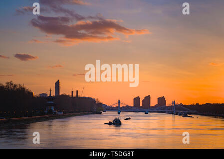 Golden sunset over the River Thames in Chelsea, London Stock Photo