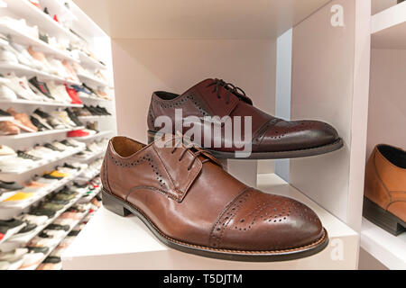 Elegant man shoes on store display Stock Photo
