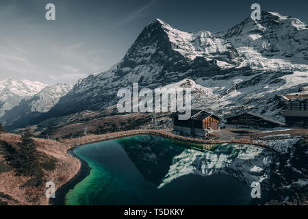 The famous Eiger and it's North Face in the Swiss Alps - impressive scenery and tourist attraction Stock Photo