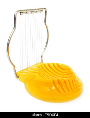 Kitchen appliance for slicing boiled eggs isolated on white Stock Photo