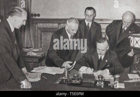 The signing of the German-Soviet Non-Aggression Pact. Ribbentrop, after Molotov, signed the diplomatic instruments of the pact which was discussed in  Stock Photo