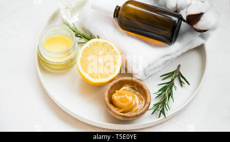 Natural organic spa ingredients with manuka honey, essential oil bottle,  clay powder , bath salt, rosemary branches, natural soap, lemon top view  with Stock Photo - Alamy