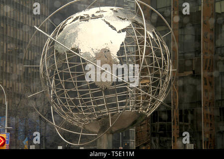 Stainless steel Unisphere sculpture in front of the Trump International Hotel and Tower at Columbus Circle, NYC, USA Stock Photo