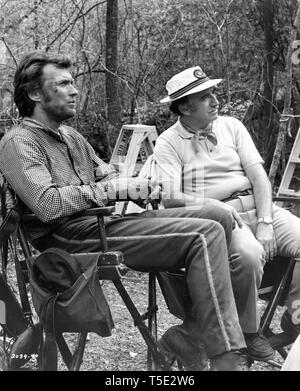 Clint Eastwood and director Don Siegel THE BEGUILED 1971 on set candid filming on location Louisiana USA  The Malpaso Company / Universal Pictures Stock Photo