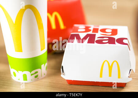 Ljubljana, Slovenia - December 27, 2018: Big Mac Box with McDonald's logo on table in McDonald's Restaurant Stock Photo