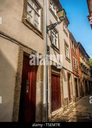 Typical narrow street in old town Porto, Portugal Stock Photo