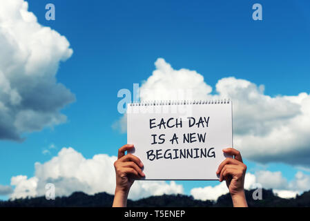 Inspirational quotes - Each day is a new beginning Stock Photo