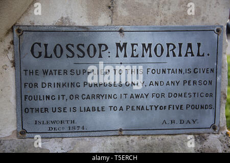 The plaque of the Glossop Memorial Fountain, drinking fountain and lamppost, Upper Square,  Isleworth England UK Stock Photo