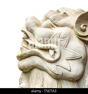 Side view detail head mythologic chinese stone lion sculpture head isolated on white background Stock Photo