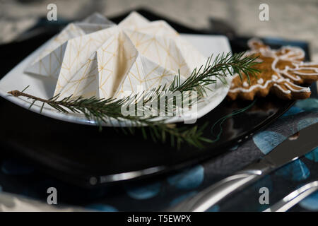 elegant table setting with decoration for dinner in regular home Stock Photo