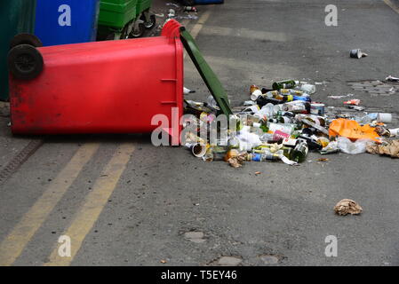 empty bottles spill out of knocked over bin Stock Photo