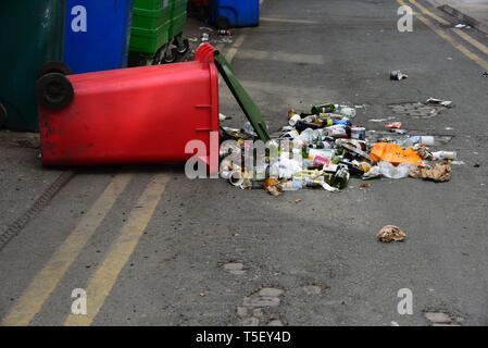 empty bottles spill out of knocked over bin Stock Photo