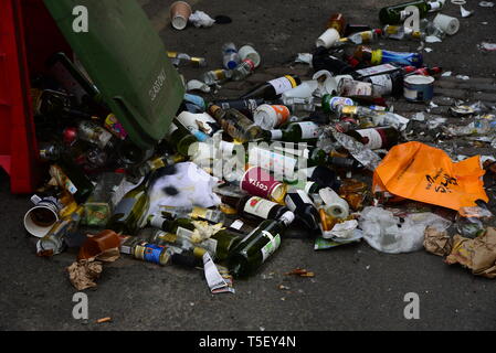 empty bottles spill out of knocked over bin Stock Photo