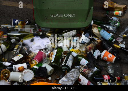 empty bottles spill out of knocked over bin Stock Photo