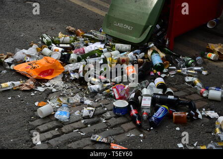 empty bottles spill out of knocked over bin Stock Photo