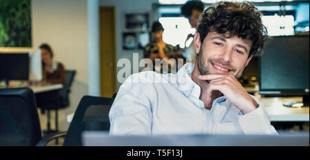 Businessman using laptop Stock Photo