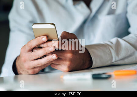Businessman using smartphone Stock Photo