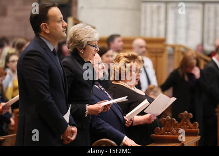 Taoiseach Leo Varadkar , Prime Minister Theresa May, President Michael D Higgins and Lord Lieutenant of Belfast Fionnuala Jay-O'Boyle during the funeral service for murdered journalist Lyra McKee at St Anne's Cathedral in Belfast. Stock Photo