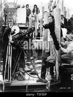 Cinematographer Bill Butler and actor Roy Scheider JAWS 1975 director Steven Spielberg on set location filming Zanuck - Brown Productions / Universal Pictures Stock Photo