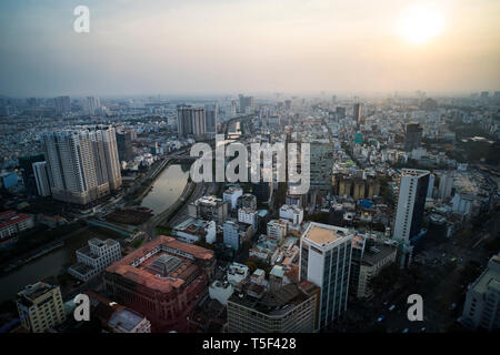 High view Saigon skyline when sunset urban areas colorful and vibrant cityscape of downtown by evening in Ho Chi Minh city, Vietnam Stock Photo