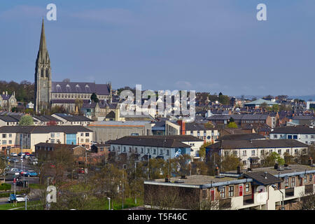 Looking down on the Bogside area of Londonderry / Derry towards St Eugene’s Cathedral. Stock Photo