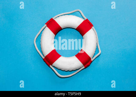 Lifebelt isolated on blue background Stock Photo