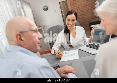 Senior couple planning their investments Stock Photo